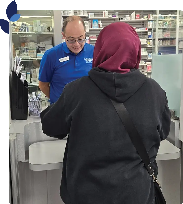 calgary pharmacist speaking with a patient